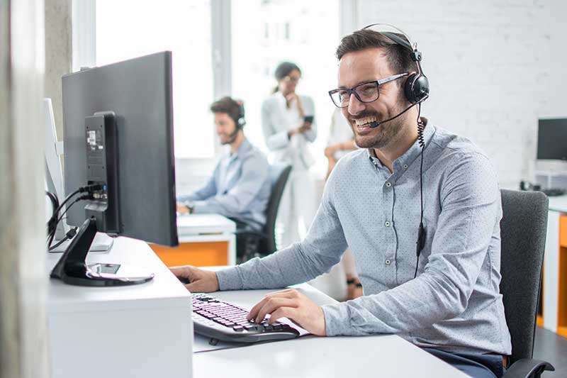 Smiling customer support operator